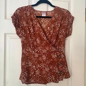 Fall orange blouse with tiny white flower pattern